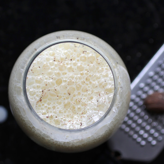 Frothy Eggnog with Coffee Rum and fresh grated Nutmeg