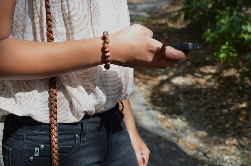 Fashion Blogger Anais Alexandre of Down to Stars wearing a Vena Cava button down with Tripp NYC leather patch pants and natural accessories