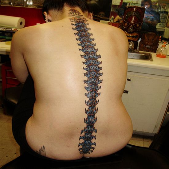 Female Spine Tattoo of Hearts