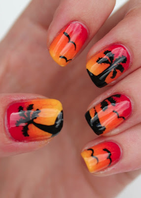 Sunset nail art with palm trees, birds and boat