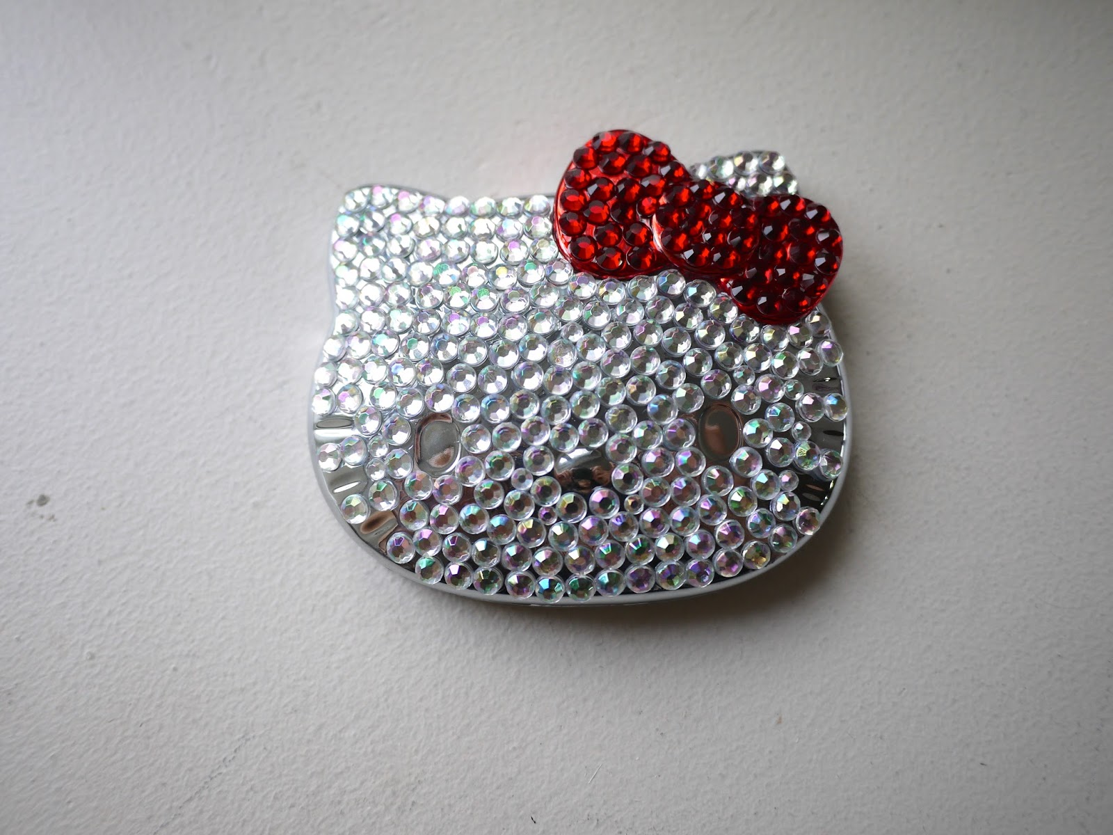 Sephora Hello Kitty Milk Money Makeup Bag and Ruby Compact MIrror review