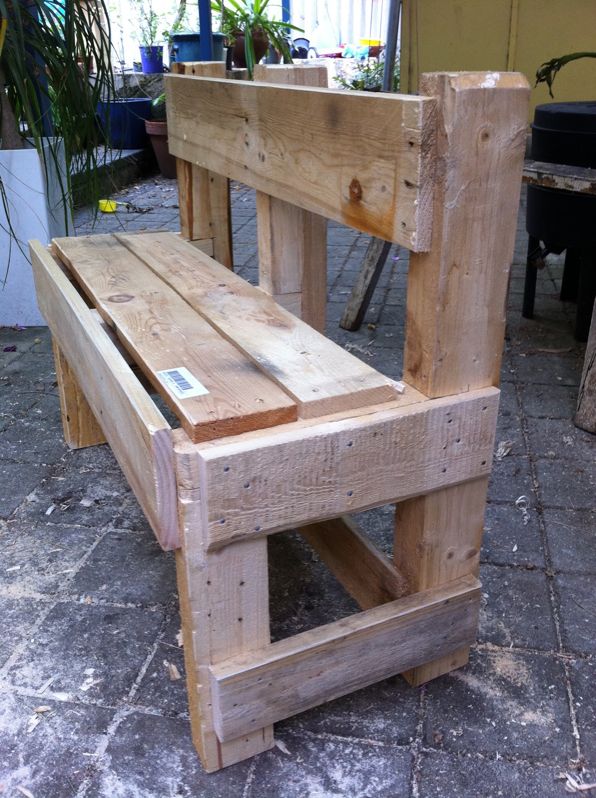 The Joy of Wood Earthcarers recycling pallets.