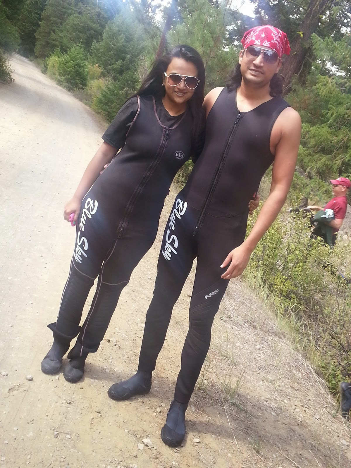 Best Rafting experience, Indian family outings in USA, Things to do near Seattle, couple in black wet suits