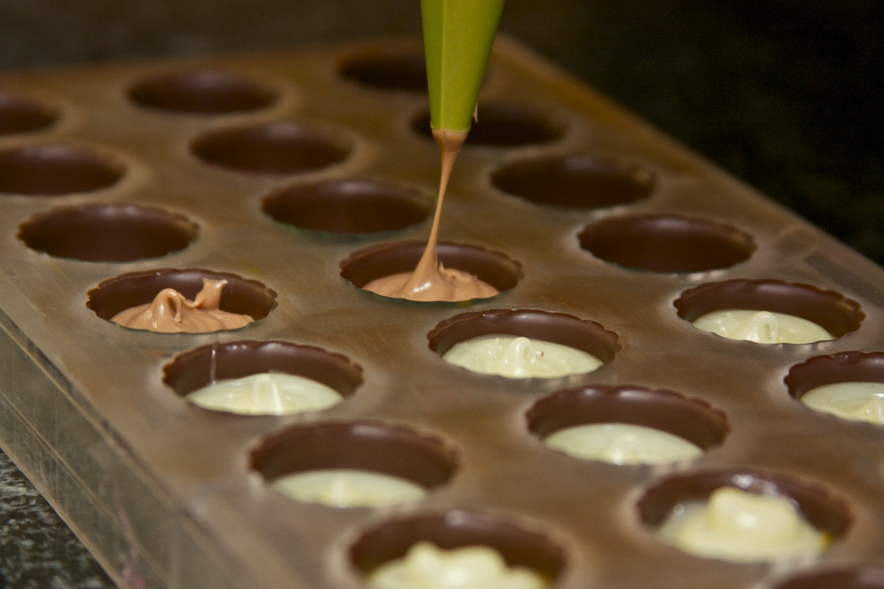 Back to Ancient Ways Molding and Filling Chocolate and Children All