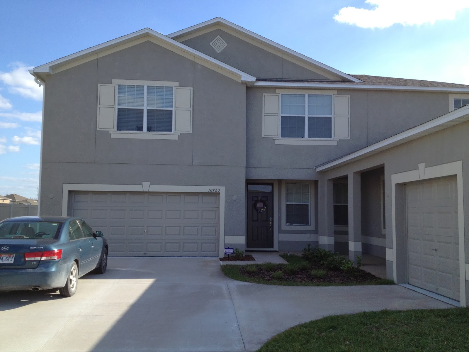 Exterior Before exterior shutters, sconce, door paint, address numbers