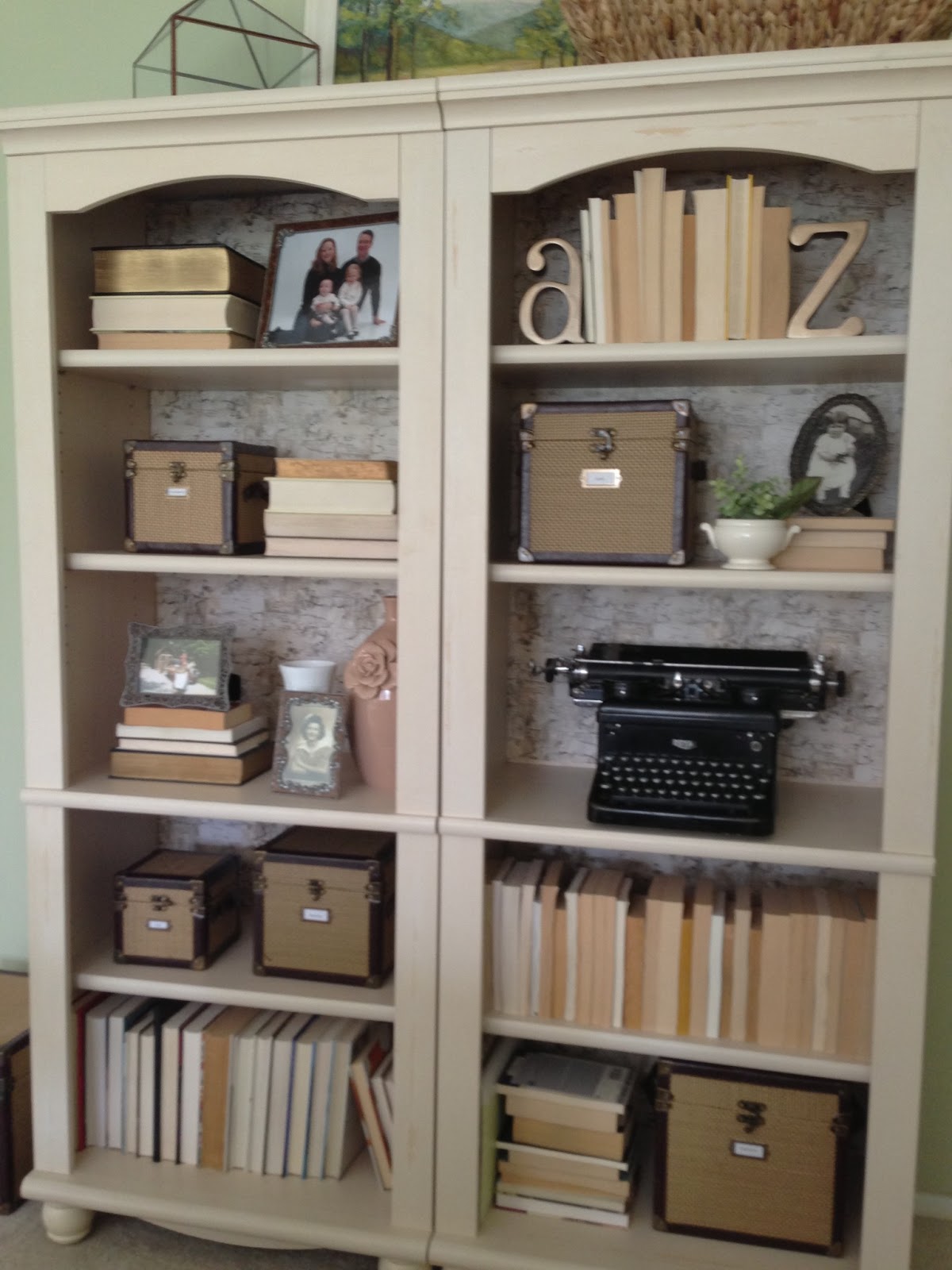 Home Made Modern Restyled Bookcases Using Wrapping Paper and