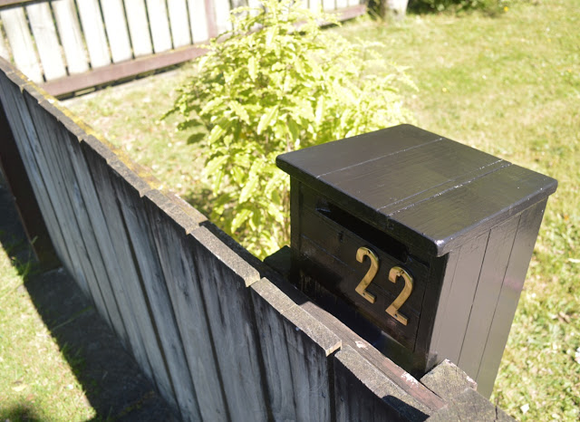 Black glossy letterbox: before and after by Amy MacLeod
