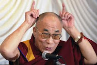 Dalai Lama two fingers pointing up