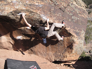 A V4 boulder problem in Unaweep Canyon in Colorado Bouldering in Unaweep Canyon in Colorado
