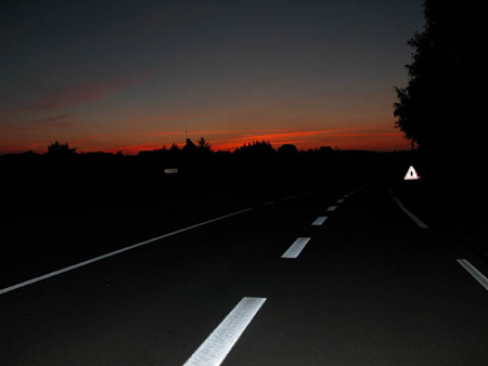 Tatto Highway on Broken White Center Line Of Highway Illuminated By Headlights At Night