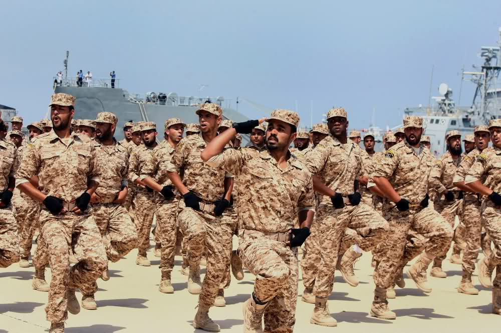 القوات الخاصة للدول العربية Soldiers+of+the+Libyan+National+Army+parade+with+their+military+pick-up+vehicles+during+the+graduation+ceremony+of+new+batch+of+the+Libyan+Navy+special+forces+the+Mediterranean+sea+port+of+Trip+%25282%2529