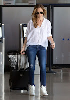 Minka Kelly   at LAX Airport in jeans and white blouse