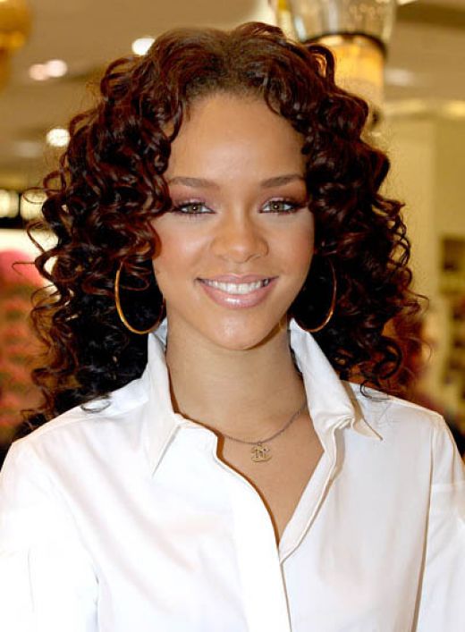 rihanna red hair curly. eva longoria short hair curly.