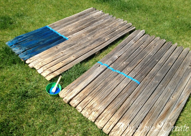 Taping Off Blue Section For Flags And Painting Fence Sections Taping Off Blue Section For Flags And Painting Fence Sections
