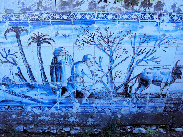 Panels of azulejos depict country life during each month of the year.