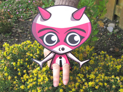 It's a walking wonder Imp Mascot paper cutout toy! It's a walking wonder Imp Mascot paper cutout toy!