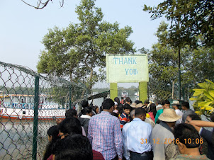 Launch tourists heading to the exit of Sudhanyakhali Camp to board the launch.