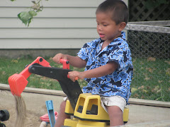 Alexandre in Cornwall, playing in the sandbox