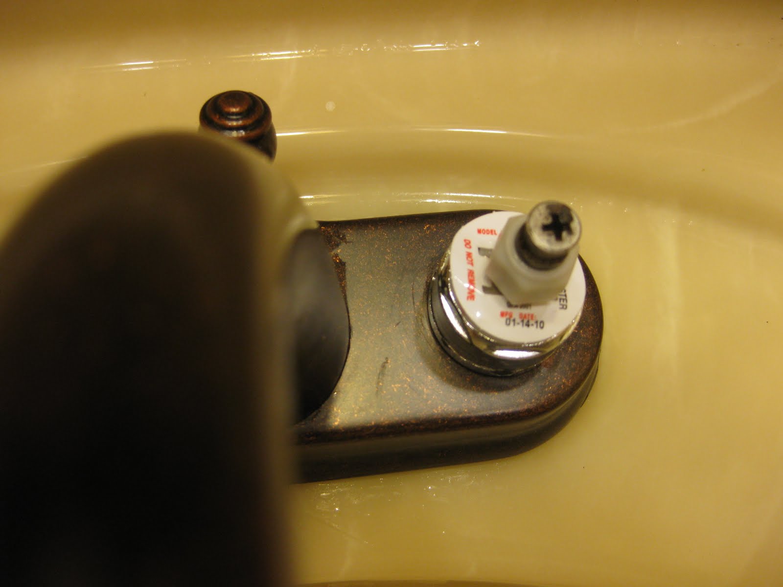 Homeowners and DIYers Calcium deposits on bathroom faucet