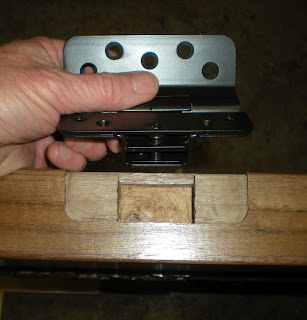Adjustable hinges on hand carved walnut door