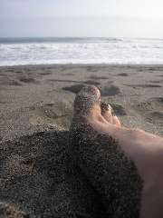 Sandy beach, sandy feet