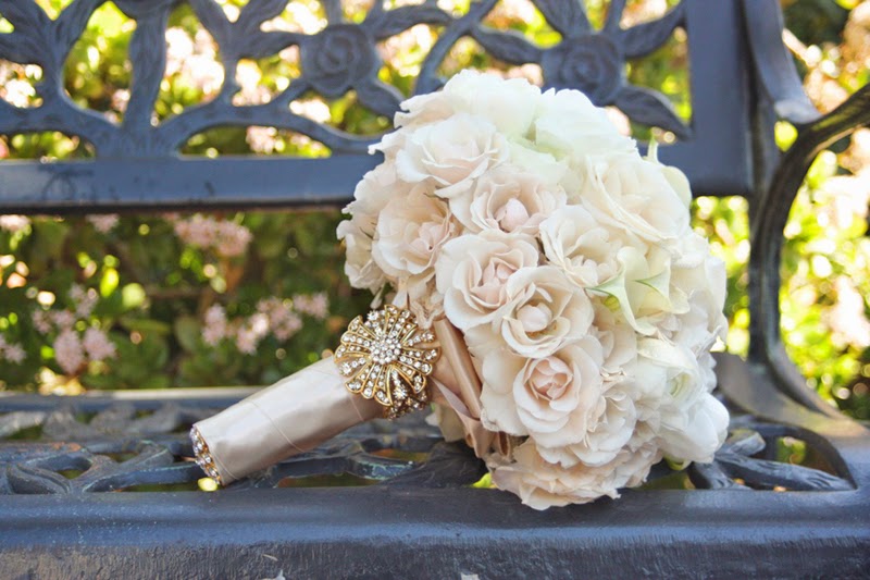 bridal wedding bouquet of white flowers with ribbon