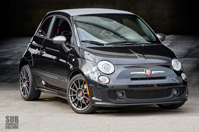 2013 Fiat 500c Abarth front 3/4 with top up