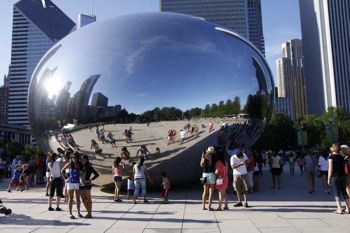 Cloud Gate, a public sculpture is the centerpiece of the AT&T Plaza in Millennium Park within the Loop community area of Chicago, Illinois, United States. The sculpture is nicknamed "The Bean" because of its bean-like shape. Made up of 168 stainless steel plates welded together, its highly polished exterior has no visible seams. 