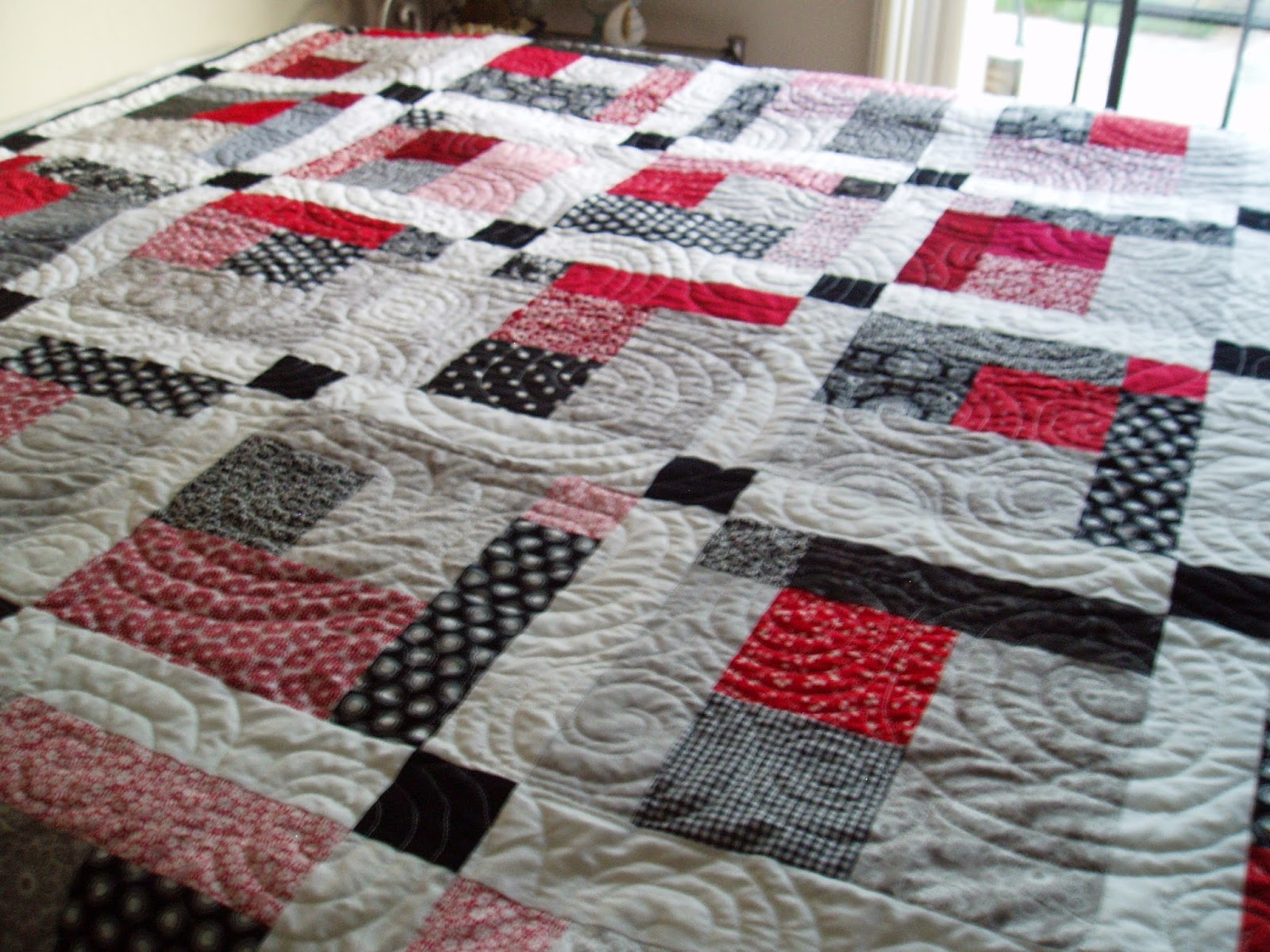 Sunshine in the Attic Red, white, black, and grey quilt finished