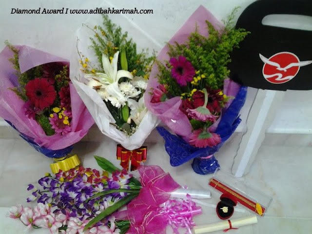 all my gifts Diamond Night Dinner Award at MIECC for premium beautiful top agents with flowers and gold plated brooch and gold chain