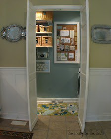 Bulletin board that covers the fuse box. Laundry room reveal. 