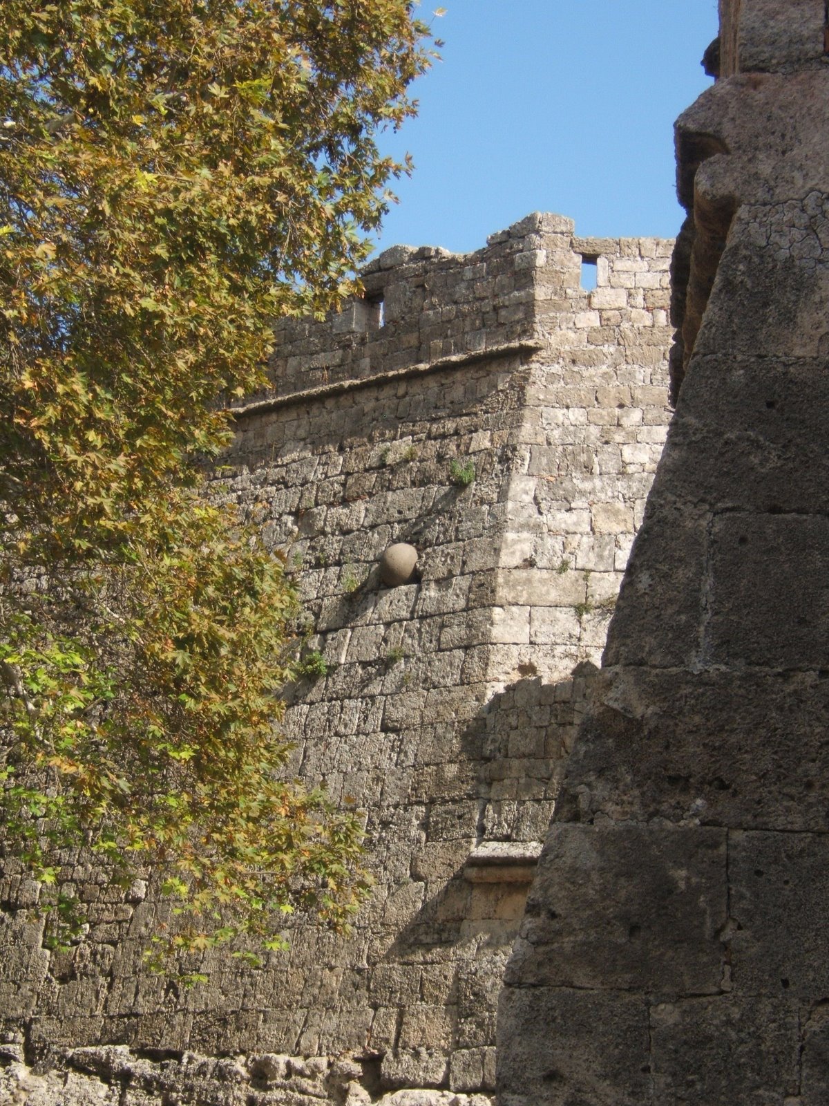 Moat wall, "Old Town", Rhodes-Greece. © 2008 Tina M. Welter Turkish catapult stone embedded in the wall, "Old Town", Rhodes-Greece. © 2008 Tina M. Welter