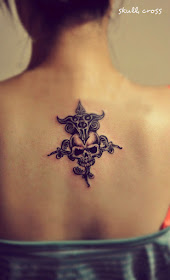 A vivid skull tattoo combined with cross