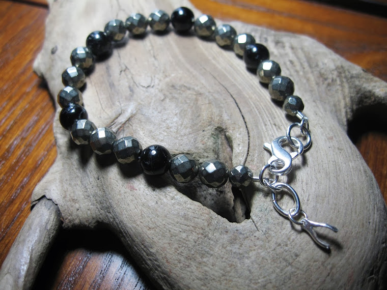 Black Tourmaline and faceted pyrite with wishbone charm.