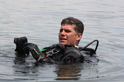 Powell assists the Houston Police Department Dive Team.