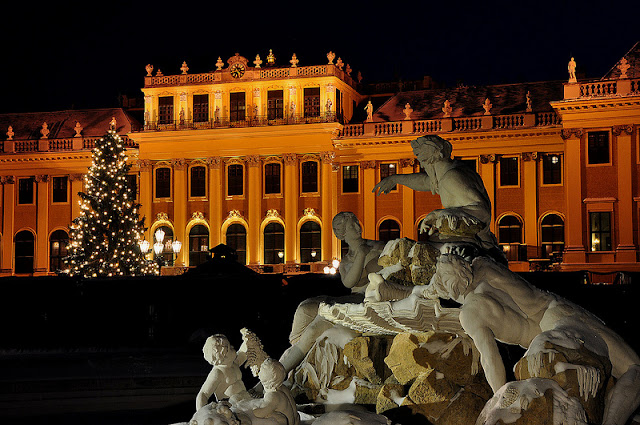 Austria's sprawling Schönbrunn Palace glows with the warmth of Christmas. Photo: Property of Viking River Cruises. Unauthorized use is prohibited.