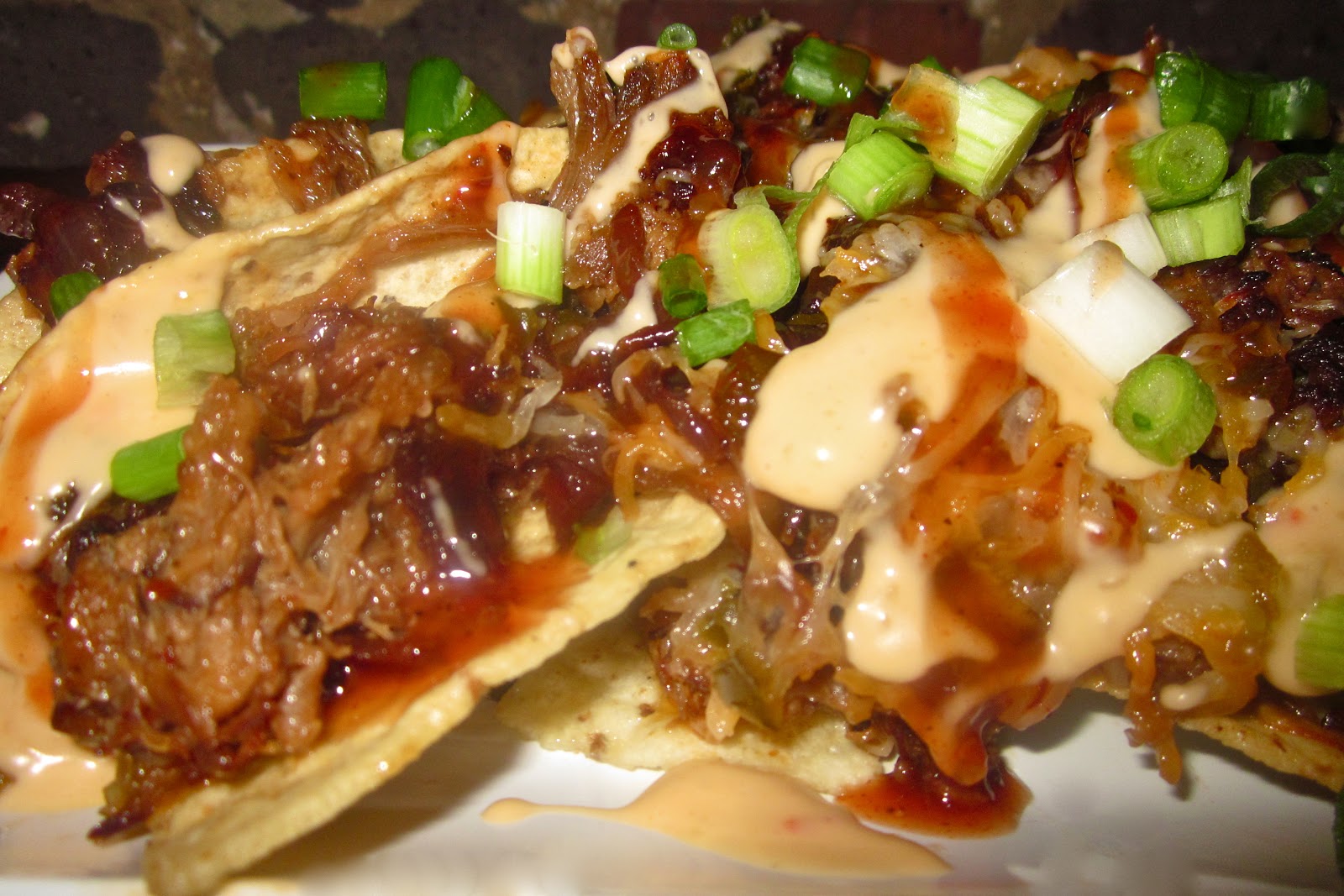 Haute + Heirloom Title Town's Famous BBQ Nachos with Pulled Pork, Pan