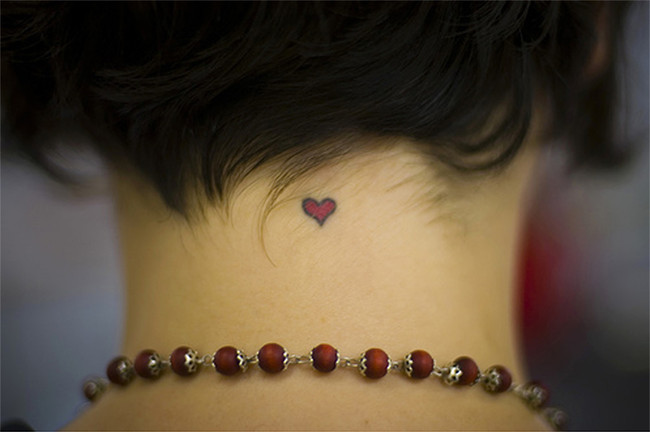 Labels small heart neck tattoo