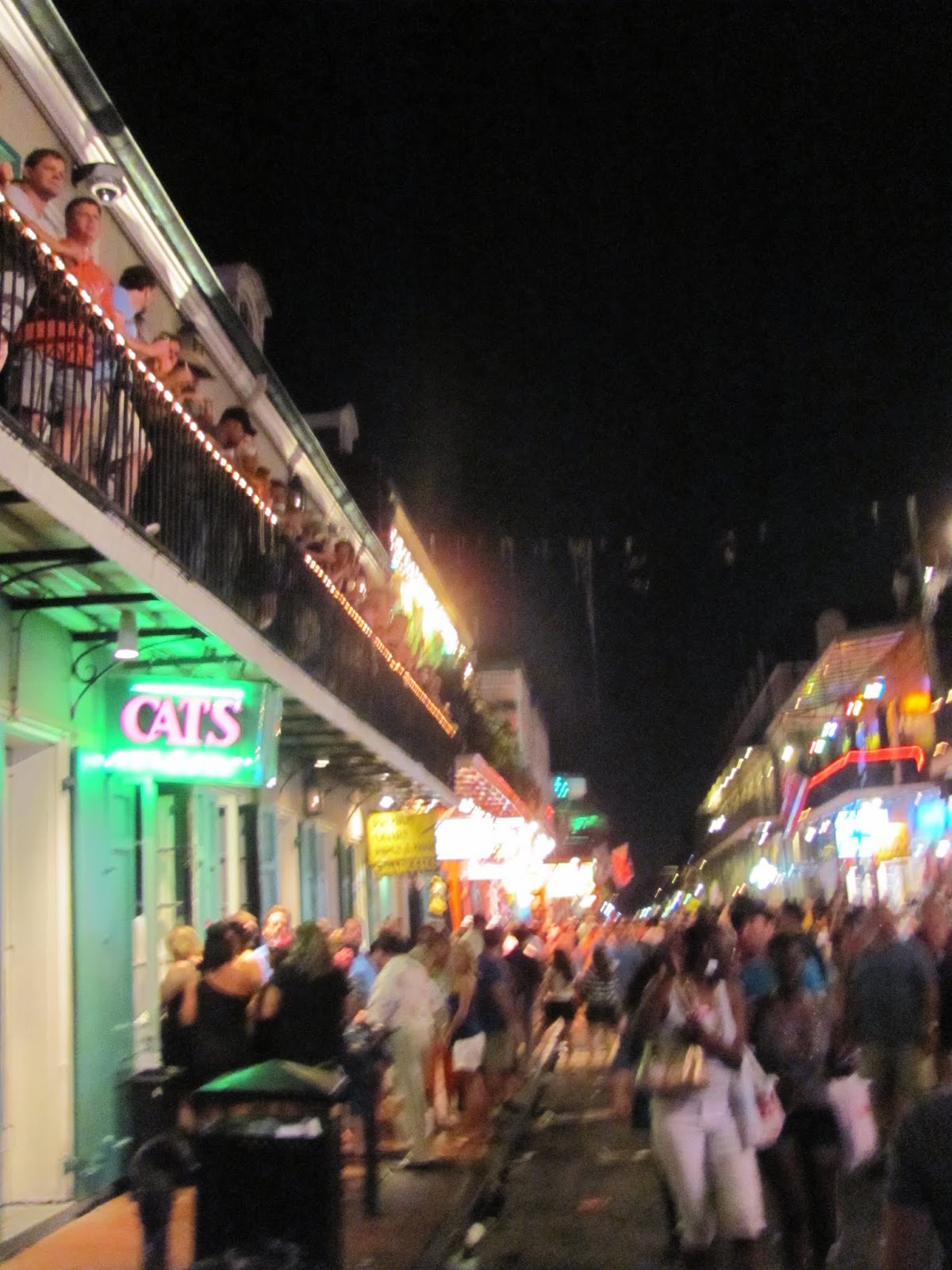 Blurry Bourbon Street A shot of Bourbon Street in New Orleans, LA at night