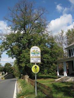 Maryland Scenic Byway C&O Canal Tour sign with Best Buddies route sign