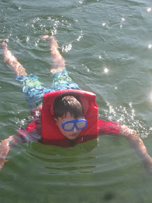 Parker swimming and snorkeling the lake