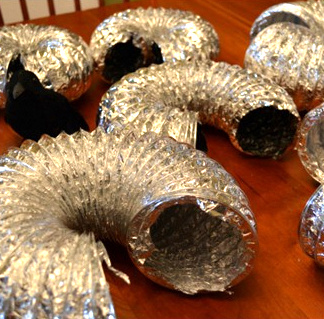 Dryer vent pumpkins by It All Started With Paint, featured on I Love That Junk