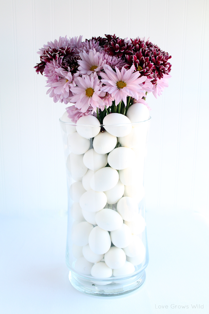 Stacked Egg Floral Arrangement by Love Grows Wild www.lovegrowswild.com #flowers #decor #spring