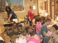 our volunteers helping with a popular program
