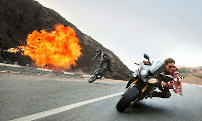 Tom Cruise riding a bike in Mission Impossible Rogue Nation