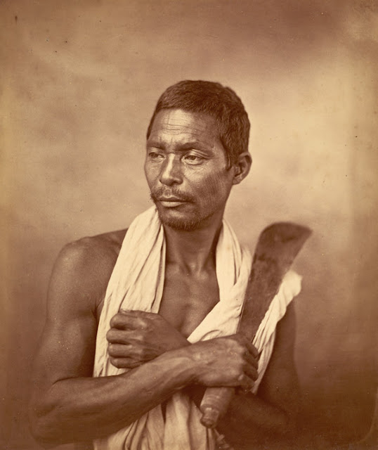 portrait+of+a+man+of+the+Kochh+Mandai+tribe+holding+a+thick-bladed+agricultural+knife+-+Eastern+Bengal+1860%2527s