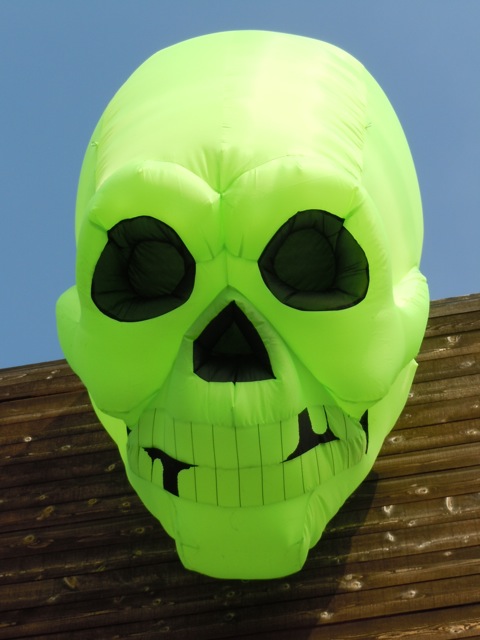 Inflatable green Halloween skull