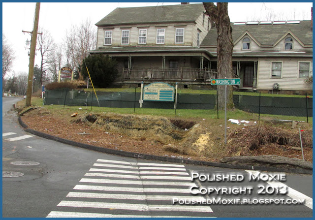 Click on picture of Sandy Hook street corner to enlarge it in a new tab. Image of an empty Sandy Hook street corner.