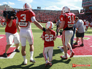 Jack Hoffman takes the field with the Nebraska football team Jack Hoffman takes the field with the Nebraska football team