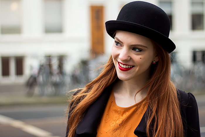 Retro / vintage fashion blogger outfit with bowler hat, pencil skirt and brogues